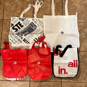 Bundle of 2 large and 3 small lululemon bags